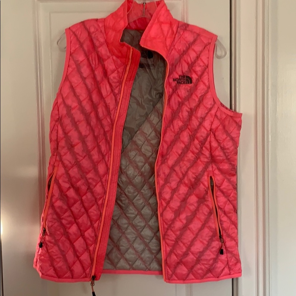 Hot pink and gray north face vest